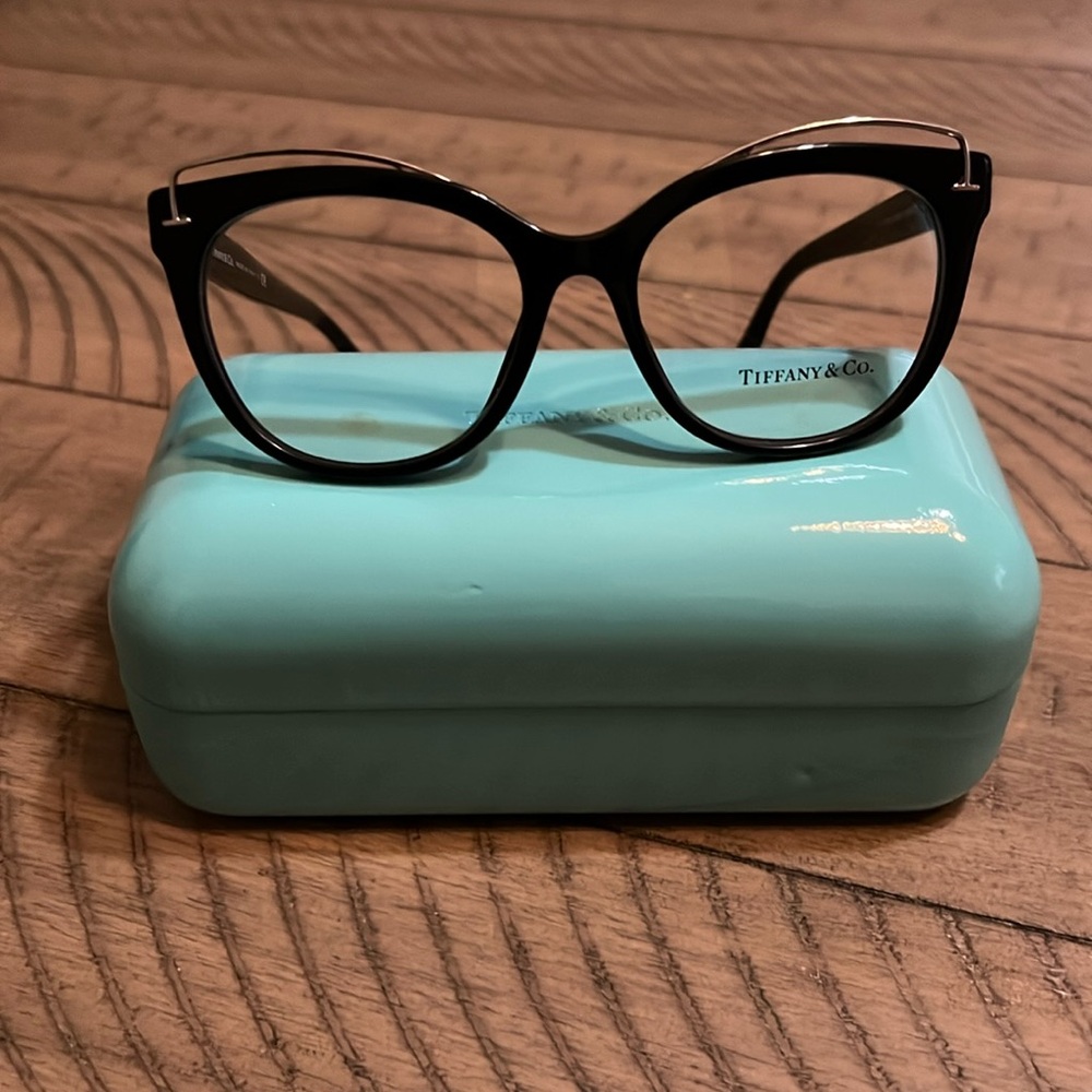 Tiffany & Co eyeglass with stylish cats eye accent color black